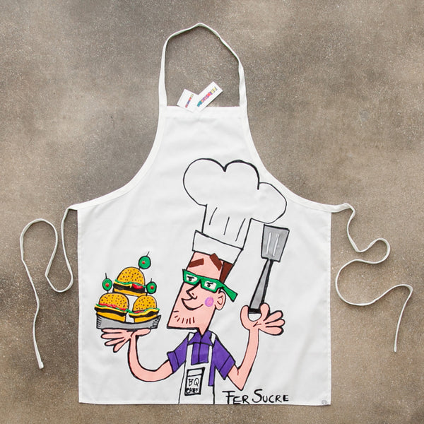 Professional Cotton Apron with Fer Sucre Painting in front. Technique: Acrylic and Plastic May be custom made, please call our Gallery for details. Measurements: 43" x 29"